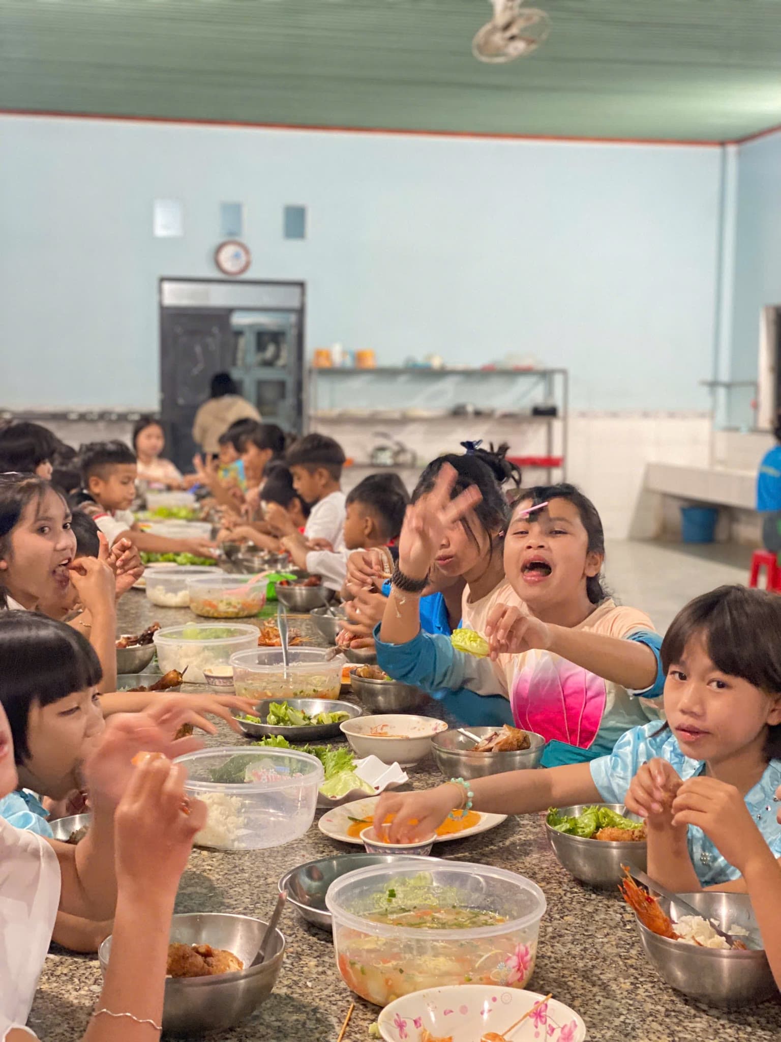 Children enjoying a shared Christmas meal