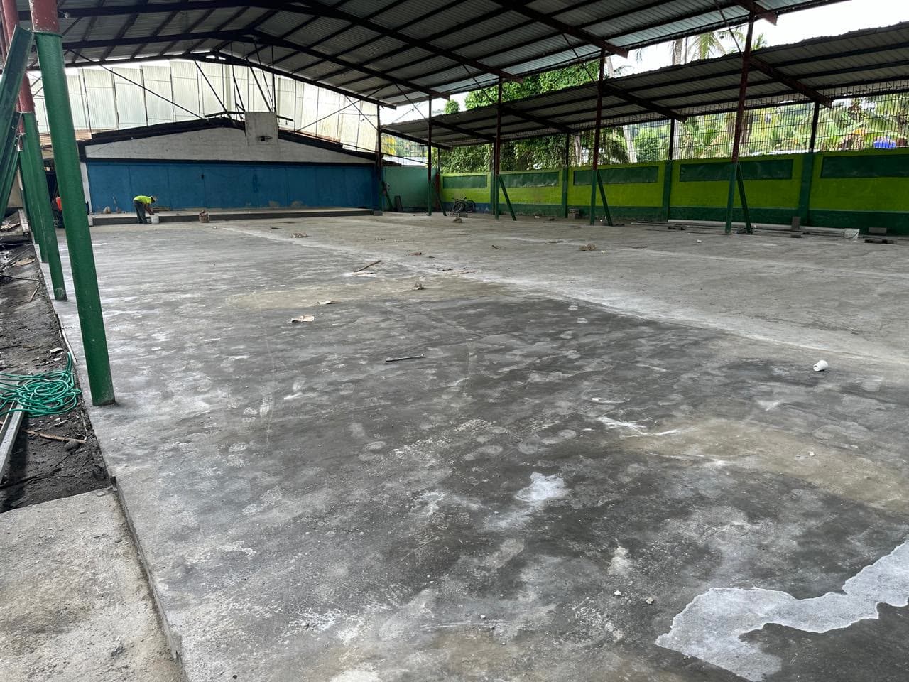 Completed concrete floor inside the covered church and community space in Panama