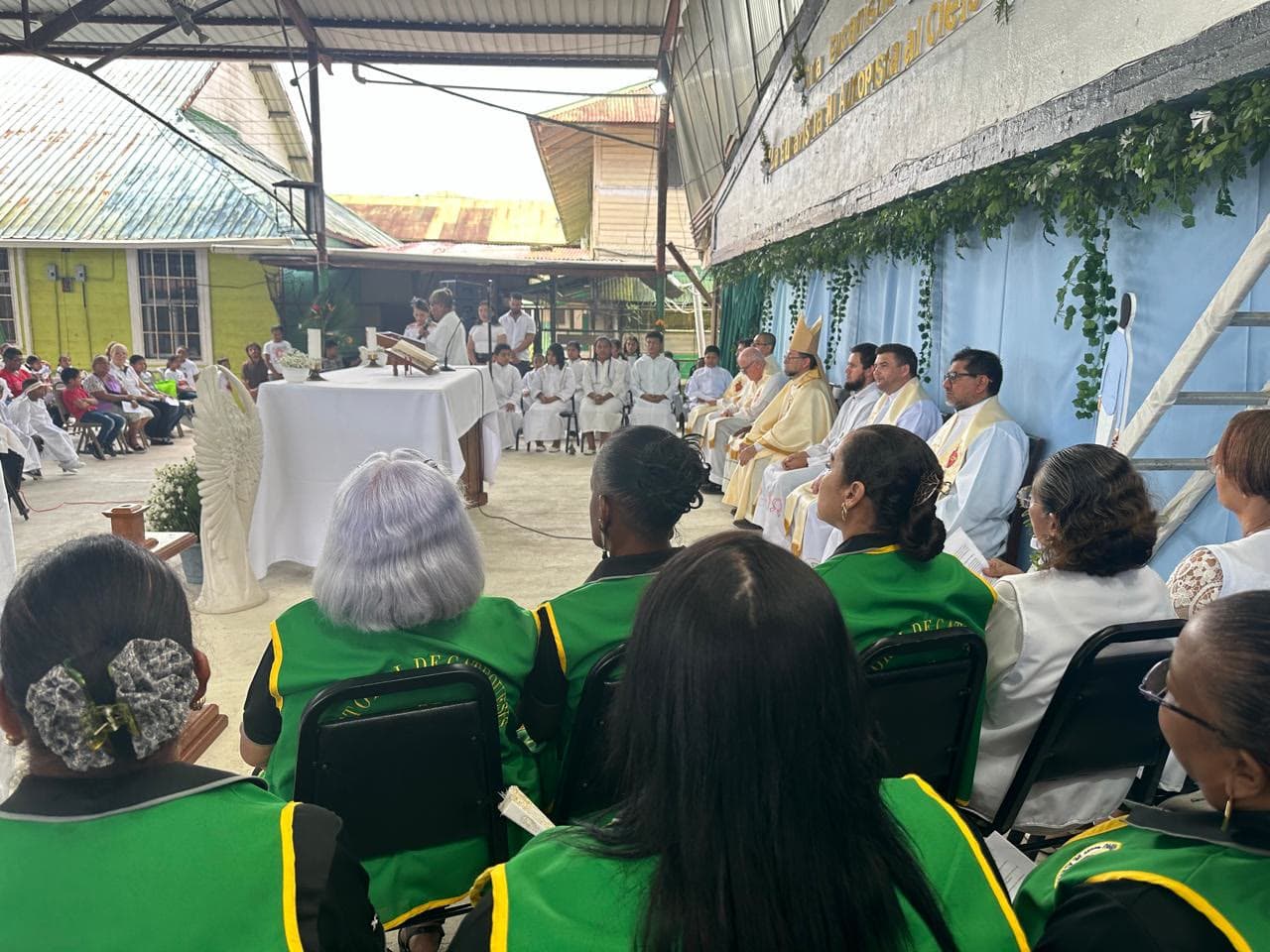 A priest celebrating Mass with the Panama parish community